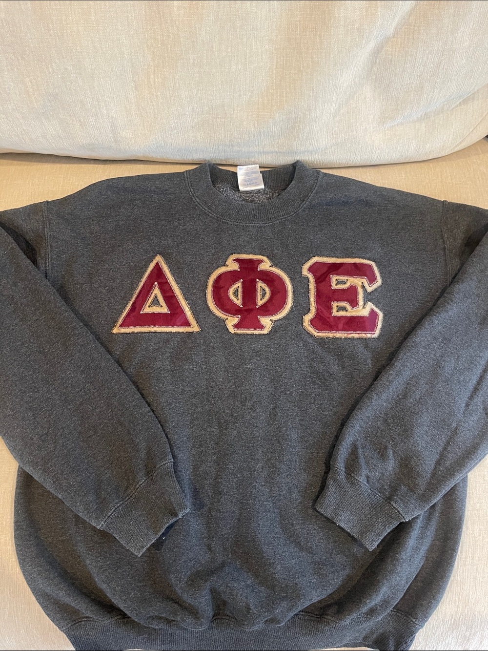 Delta Phi Epsilon Gray Crewneck Sweatshirt with Burgundy Lettering